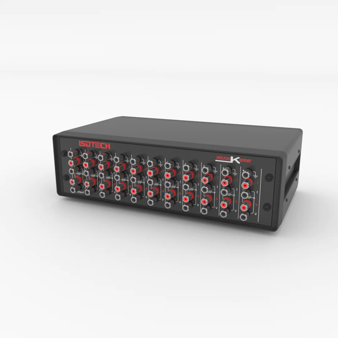 An Isotech microsKanner channel-expansion unit in a black case, angled, with ten paired columns of red and black input terminals across the front panel and 'microsKanner' printed in white and red at the top right.